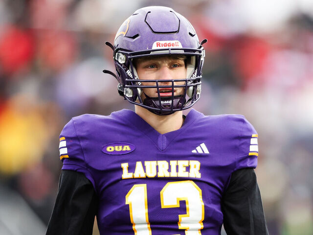 KINGSTON, CANADA - NOVEMBER 23: Taylor Elgersma #13 of Laurier Golden Hawks looks on during the second quarter against the Laval Rouge et Or during the 2024 Vanier Cup at Richardson Memorial Stadium on November 23, 2024 in Kingston, Ontario, Canada.