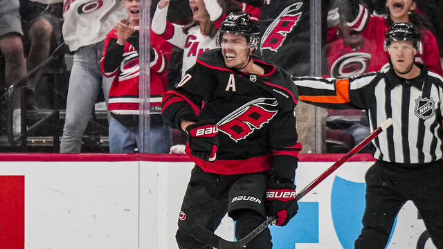 RALEIGH, NORTH CAROLINA - APRIL 29: Sebastian Aho #20 of the Carolina Hurricanes celebrates after scoring a goal against the New Jersey Devils during the second period of Game Five of the First Round of the 2025 Stanley Cup Playoffs at Lenovo Center on April 29, 2025 in Raleigh, North Carolina.