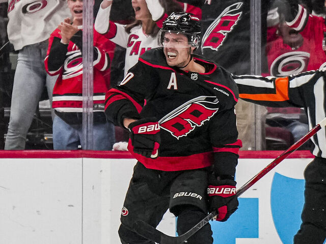RALEIGH, NORTH CAROLINA - APRIL 29: Sebastian Aho #20 of the Carolina Hurricanes celebrates after scoring a goal against the New Jersey Devils during the second period of Game Five of the First Round of the 2025 Stanley Cup Playoffs at Lenovo Center on April 29, 2025 in Raleigh, North Carolina.