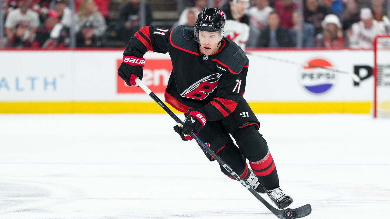 RALEIGH, NORTH CAROLINA - APRIL 20: Taylor Hall #71 of the Carolina Hurricanes controls the puck against the New Jersey Devils in Game One of the First Round of the 2025 Stanley Cup Playoffs at Lenovo Center on April 20, 2025 in Raleigh, North Carolina.