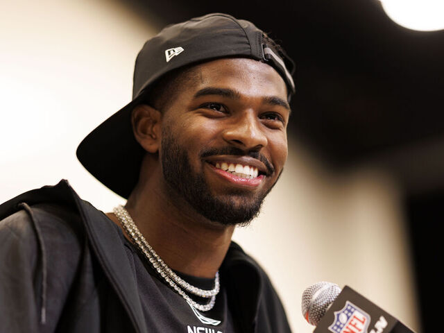 INDIANAPOLIS, INDIANA - FEBRUARY 28: Shedeur Sanders #QB13 of Colorado speaks at the podium during the 2025 NFL Combine at the Indiana Convention Center on February 28, 2025 in Indianapolis, Indiana.
