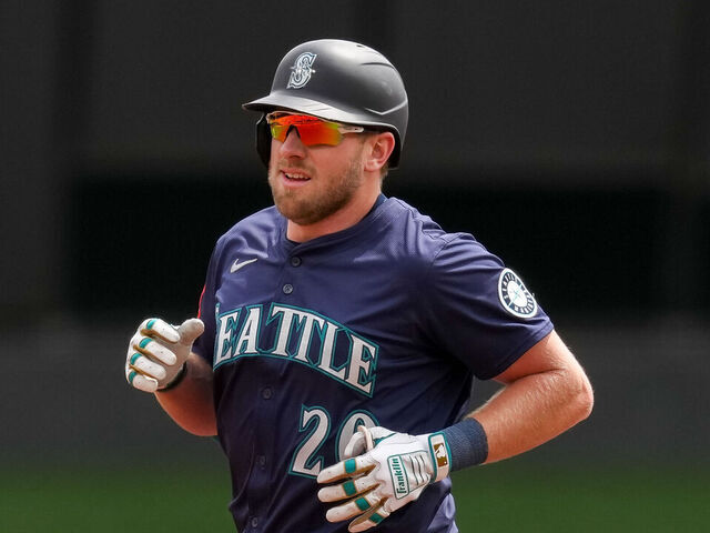 CINCINNATI, OHIO - APRIL 17: Luke Raley #20 of the Seattle Mariners rounds the bases after hitting a home run in the fourth inning against the Cincinnati Reds at Great American Ball Park on April 17, 2025 in Cincinnati, Ohio.
