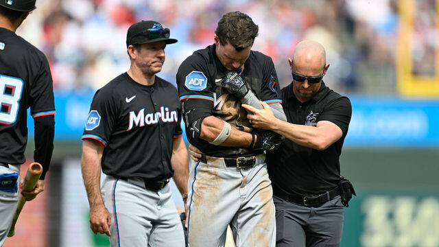 PHILADELPHIA, PA - APRIL 19: Miami Marlins outfielder Griffin Conine (18) walks off the fields after getting injured during the game between the Miami Marlins and the Philadelphia Phillies on April 19th, 2025 at Citizens Bank Park in Philadelphia, PA.