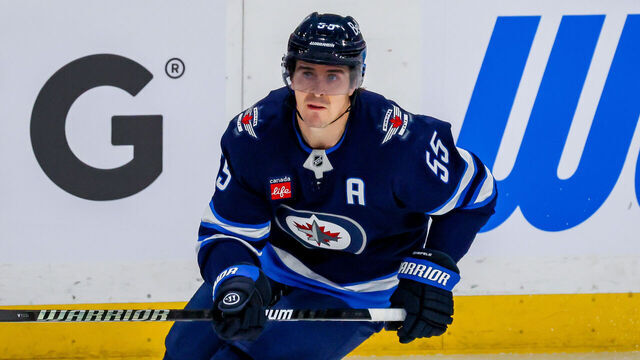 WINNIPEG, CANADA - APRIL 19: Mark Scheifele #55 of the Winnipeg Jets skates during third period action against the St. Louis Blues in Game One of the First Round of the 2025 Stanley Cup Playoffs at Canada Life Centre on April 19, 2025 in Winnipeg, Manitoba, Canada.
