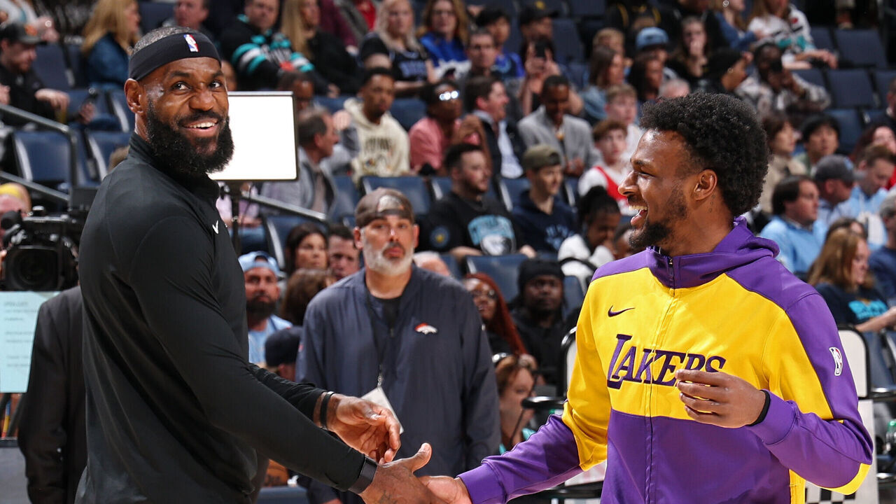 MEMPHIS, TN - MARCH 29: LeBron James #23 & Bronny James #9 of the Los Angeles Lakers high five before the game against the Memphis Grizzlies on March 29, 2025 at FedExForum in Memphis, Tennessee. Mandatory Copyright Notice: Copyright 2025 NBAE