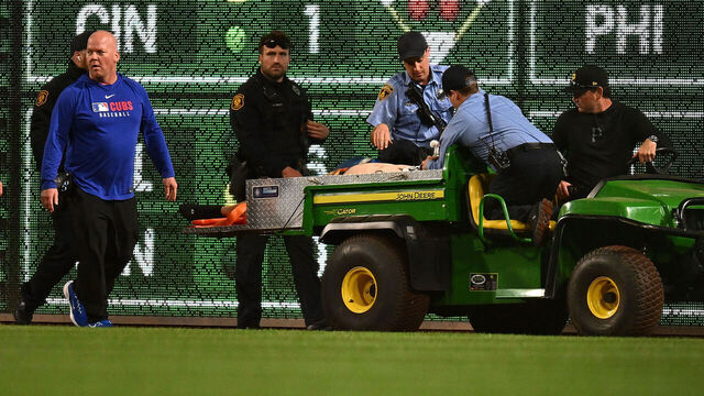 PITTSBURGH, PENNSYLVANIA - APRIL 30: A fan is carted off the field after falling from the stands during the seventh inning of the game between the Chicago Cubs and the Pittsburgh Pirates at PNC Park on April 30, 2025 in Pittsburgh, Pennsylvania.
