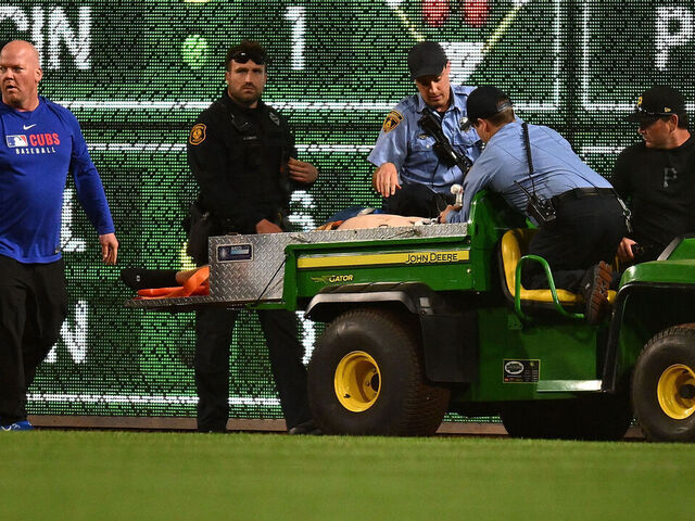 PITTSBURGH, PENNSYLVANIA - APRIL 30: A fan is carted off the field after falling from the stands during the seventh inning of the game between the Chicago Cubs and the Pittsburgh Pirates at PNC Park on April 30, 2025 in Pittsburgh, Pennsylvania.