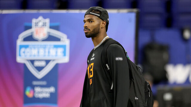 INDIANAPOLIS, INDIANA - MARCH 01: Shedeur Sanders #QB13 of Colorado looks on during the NFL Scouting Combine at Lucas Oil Stadium on March 01, 2025 in Indianapolis, Indiana.