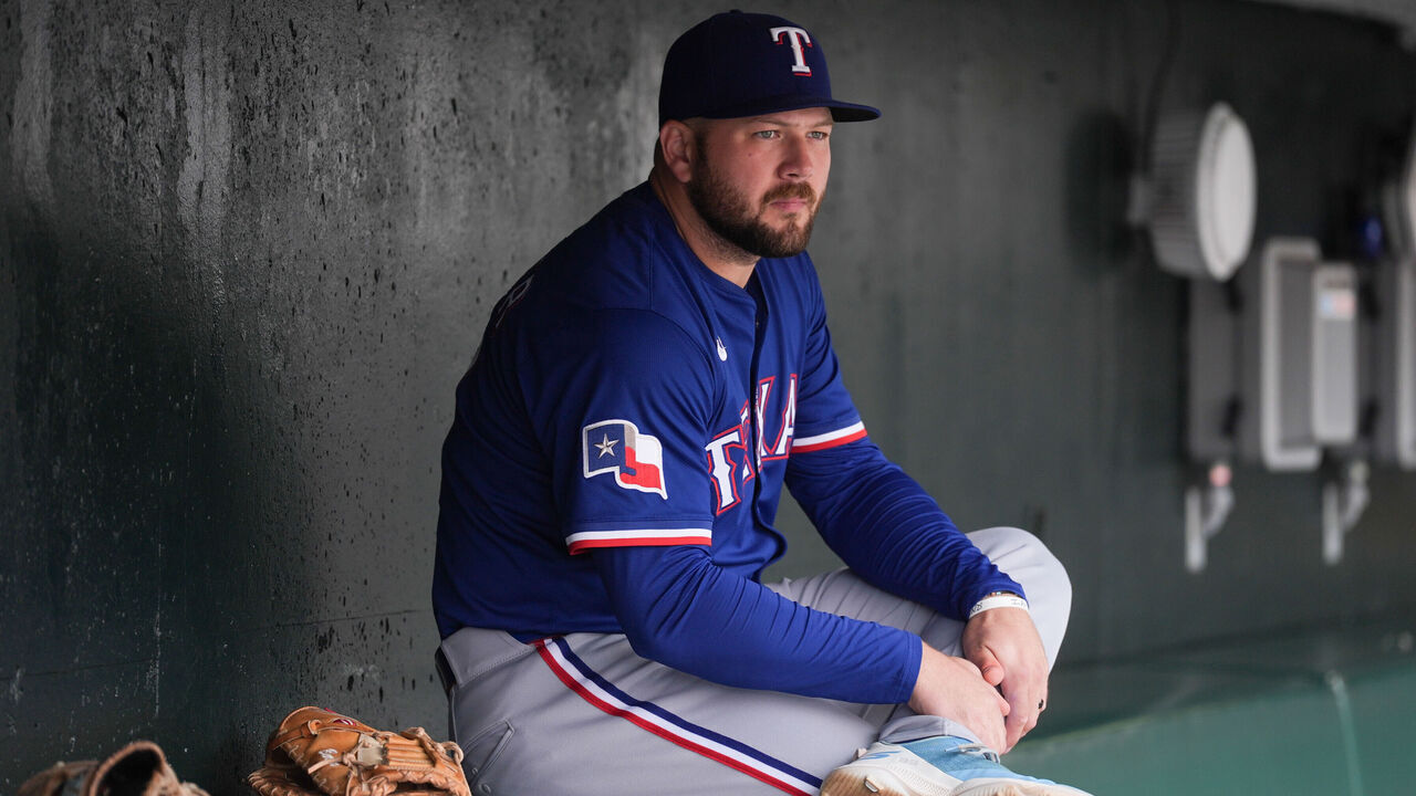 SAN FRANCISCO, CA - APRIL 27: Jake Burger #21 of the Texas Rangers looks on from the dugout prior to the game between the Texas Rangers and the San Francisco Giants at Oracle Park on Sunday, April 27, 2025 in San Francisco, California.