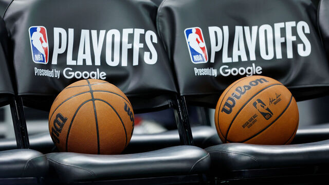 MILWAUKEE, WISCONSIN - APRIL 25: A picture of Wilson basketballs and the playoff logo on the seats before game three of the first round of the 2025 NBA playoffs between the Indiana Pacers and the Milwaukee Bucks at Fiserv Forum on April 25, 2025 in Milwaukee, Wisconsin.