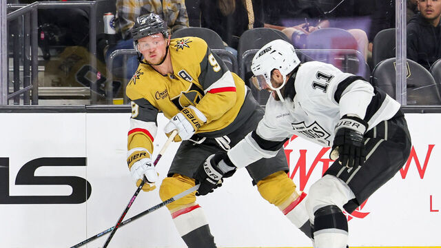 LAS VEGAS, NEVADA - OCTOBER 22: Jack Eichel #9 of the Vegas Golden Knights passes under pressure from Anze Kopitar #11 of the Los Angeles Kings in the second period of their game at T-Mobile Arena on October 22, 2024 in Las Vegas, Nevada.