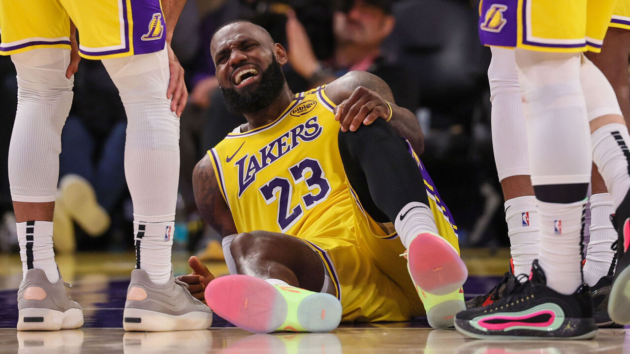 Los Angeles, CA, Wednesday, April 30, 2025 -Los Angeles Lakers forward LeBron James (23) cringes in pain after injuring his leg in the second half against the Minnesota Timberwolves in game 5 of the first round of the NBA playoffs at Crypto.com Arena. (Robert Gauthier/Los Angeles Times via Getty Images)