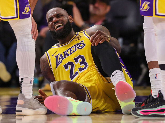 Los Angeles, CA, Wednesday, April 30, 2025 -Los Angeles Lakers forward LeBron James (23) cringes in pain after injuring his leg in the second half against the Minnesota Timberwolves in game 5 of the first round of the NBA playoffs at Crypto.com Arena. (Robert Gauthier/Los Angeles Times via Getty Images)