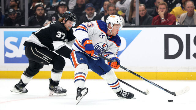 LOS ANGELES, CALIFORNIA - APRIL 21: Jeff Skinner #53 of the Edmonton Oilers skates with the puck as Warren Foegele #37 of the Los Angeles Kings defends during the first period in Game One of the First Round of the 2025 Stanley Cup Playoffs at Crypto.com Arena on April 21, 2025 in Los Angeles, California.