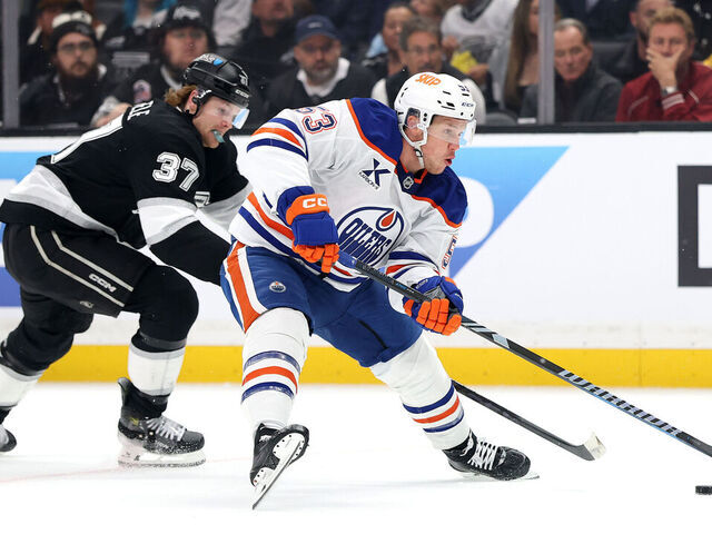 LOS ANGELES, CALIFORNIA - APRIL 21: Jeff Skinner #53 of the Edmonton Oilers skates with the puck as Warren Foegele #37 of the Los Angeles Kings defends during the first period in Game One of the First Round of the 2025 Stanley Cup Playoffs at Crypto.com Arena on April 21, 2025 in Los Angeles, California.