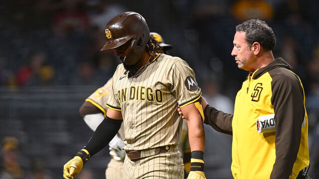 PITTSBURGH, PENNSYLVANIA - MAY 2: Fernando Tatis Jr. #23 of the San Diego Padres is removed from the game after being hit by a pitch during the third inning against the Pittsburgh Pirates at PNC Park on May 2, 2025 in Pittsburgh, Pennsylvania.