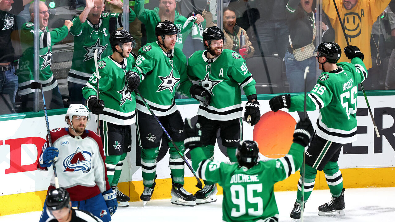 DALLAS, TEXAS - MAY 03: Mikko Rantanen #96 of the Dallas Stars is congratulated by his teammates after scoring the game-tying goal against the Colorado Avalanche during the third period in Game Seven of the First Round of the 2025 Stanley Cup Playoffs at American Airlines Center on May 03, 2025 in Dallas, Texas.
