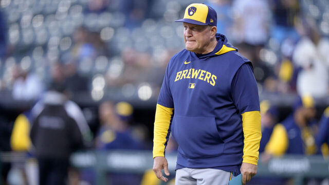 CHICAGO, ILLINOIS - APRIL 29: Pat Murphy #49 of the Milwaukee Brewers walks out to exchange line ups before a game against the Chicago White Sox at Rate Field on April 29, 2025 in Chicago, Illinois.