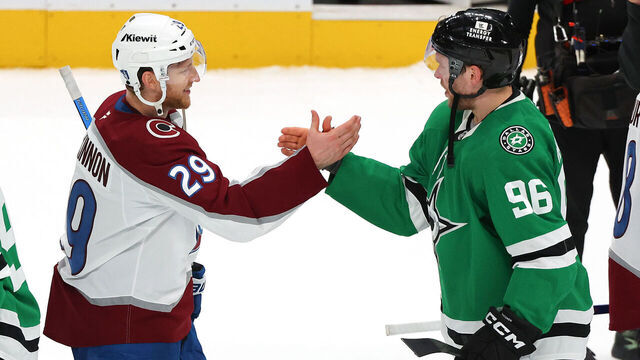 DALLAS, TEXAS - MAY 03: Nathan MacKinnon #29 of the Colorado Avalanche and Mikko Rantanen #96 of the Dallas Stars shakes hands after the Stars 4-2 win in Game Seven of the First Round of the 2025 Stanley Cup Playoffs at American Airlines Center on May 03, 2025 in Dallas, Texas.