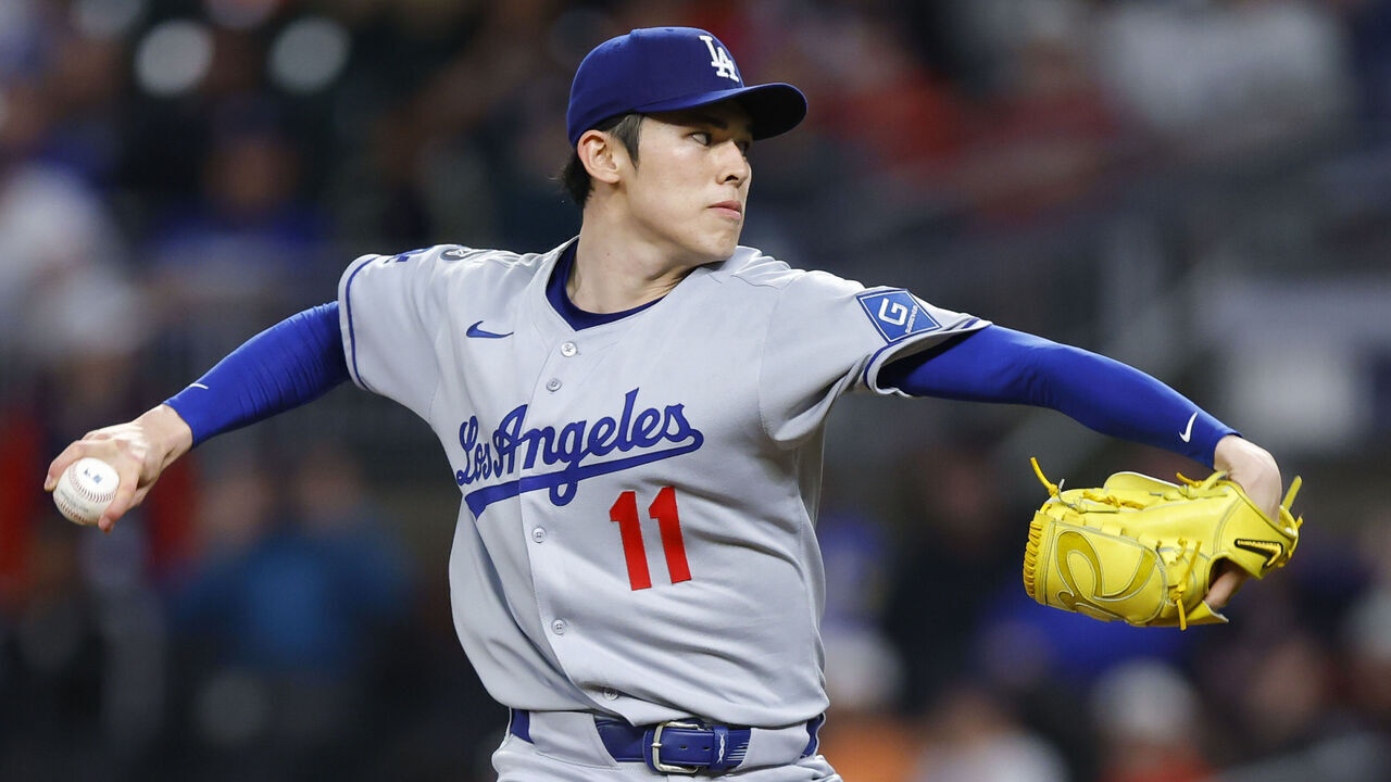 ATLANTA, GEORGIA - MAY 3: Roki Sasaki #11 of the Los Angeles Dodgers pitches during the first inning against the Atlanta Braves at Truist Park on May 3, 2025 in Atlanta, Georgia.