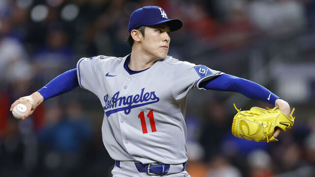 ATLANTA, GEORGIA - MAY 3: Roki Sasaki #11 of the Los Angeles Dodgers pitches during the first inning against the Atlanta Braves at Truist Park on May 3, 2025 in Atlanta, Georgia.