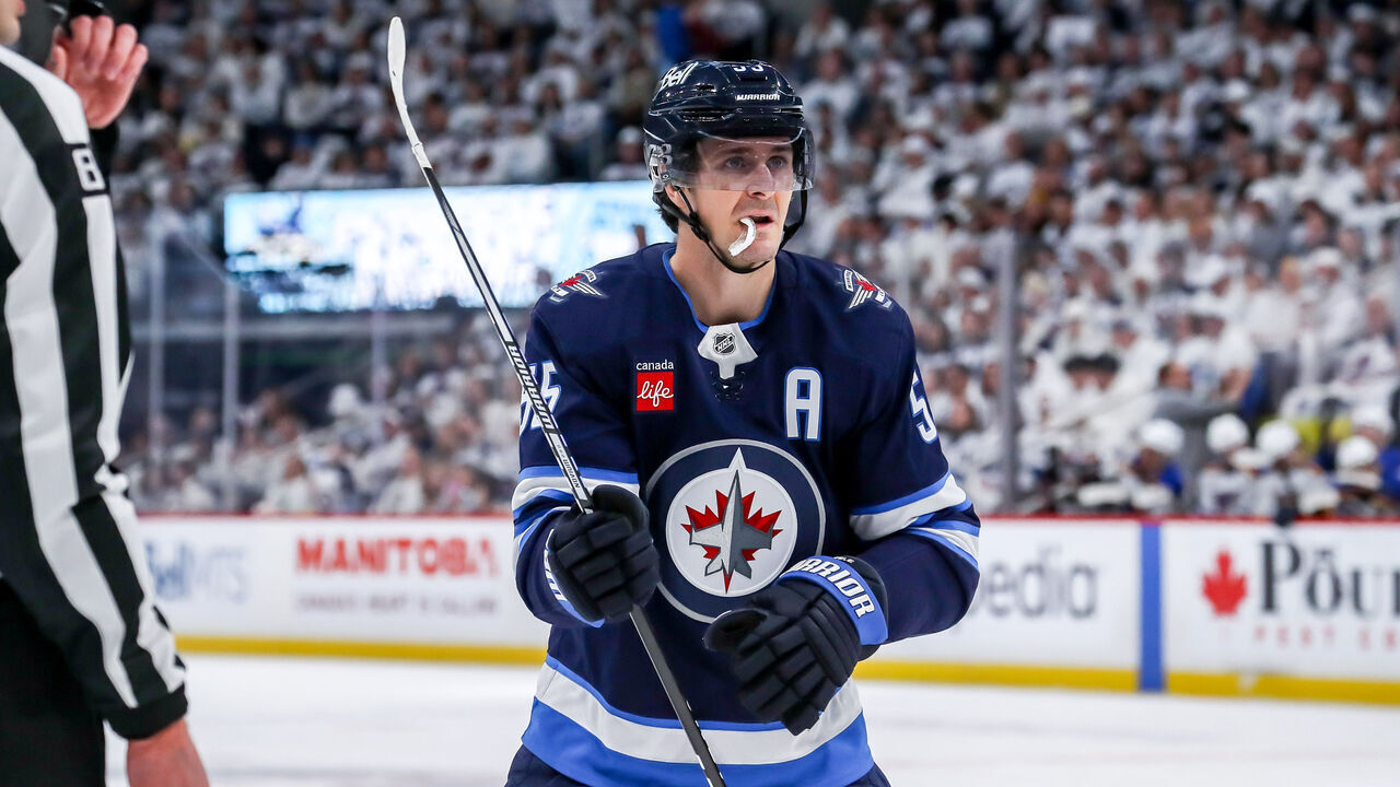 WINNIPEG, CANADA - APRIL 19: Mark Scheifele #55 of the Winnipeg Jets gets set to take a second period face-off against the St. Louis Blues in Game One of the First Round of the 2025 Stanley Cup Playoffs at the Canada Life Centre on April 19, 2025 in Winnipeg, Manitoba, Canada. The Jets defeated the Blues 5-3 and lead the series 1-0.