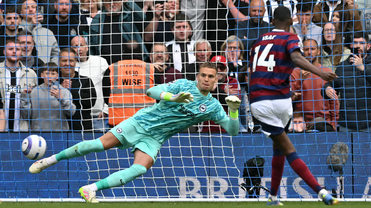 Brighton's Dutch goalkeeper #01 Bart Verbruggen watches the ball as he concedes a penalty from Newcastle United's Swedish striker #14 Alexander Isak during the English Premier League football match between Brighton and Hove Albion and Newcastle United at the American Express Community Stadium in Brighton, southern England on May 4, 2025.