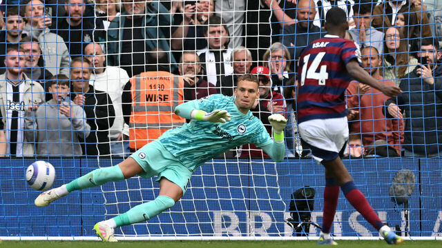 Brighton's Dutch goalkeeper #01 Bart Verbruggen watches the ball as he concedes a penalty from Newcastle United's Swedish striker #14 Alexander Isak during the English Premier League football match between Brighton and Hove Albion and Newcastle United at the American Express Community Stadium in Brighton, southern England on May 4, 2025.