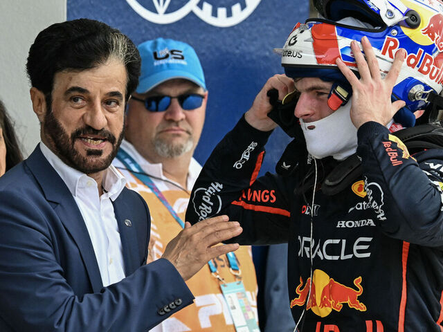 (L-R) FIA President Mohammed Ben Sulayem talks to Red Bull Racing's Dutch driver Max Verstappen after Verstappen won the pole position during the qualifying session for the 2025 Miami Formula One Grand Prix at Miami International Autodrome in Miami Gardens, Florida, on May 3, 2025.