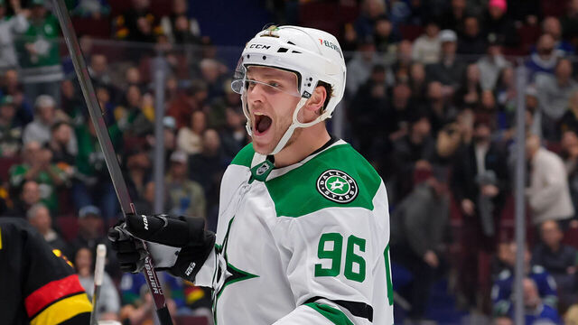 VANCOUVER, CANADA - MARCH 9: Mikko Rantanen #96 of the Dallas Stars celebrates a goal on Kevin Lankinen #32 of the Vancouver Canucks during the second period of their NHL game at Rogers Arena on March 9, 2025 in Vancouver, British Columbia, Canada.