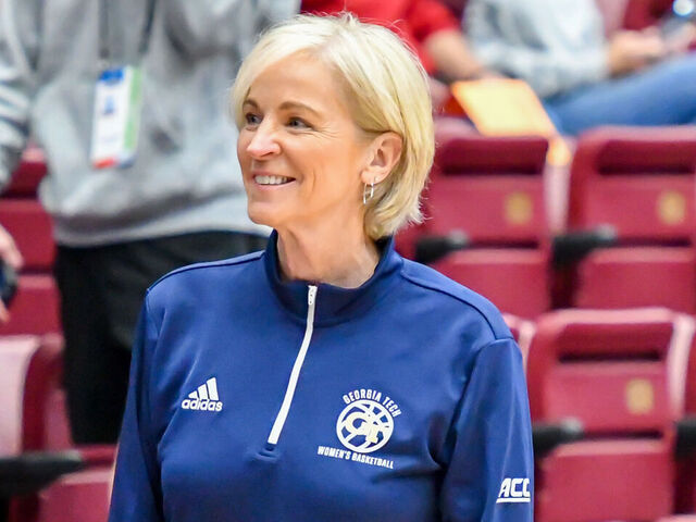 PALO ALTO, CA - MARCH 18: Georgia Tech Yellow Jackets head coach Nell Fortner getting ready for her team to come out for the 1st Round of playoffs between the Georgia Tech Yellow Jackets and the Kansas Jayhawks on Friday, March 18, 2022 at Maples Pavilion in Palo Alto, California.