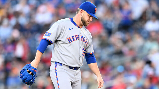 WASHINGTON, DC - APRIL 26: A.J. Minter #33 of the New York Mets walks off the field after an injury during the game against the Washington Nationals at Nationals Park on April 26, 2025 in Washington, DC.