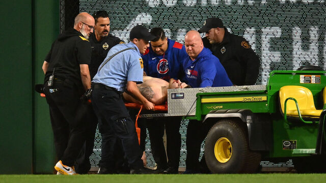 PITTSBURGH, PENNSYLVANIA - APRIL 30: A fan is carted off the field after falling from the stands during the seventh inning of the game between the Chicago Cubs and the Pittsburgh Pirates at PNC Park on April 30, 2025 in Pittsburgh, Pennsylvania.