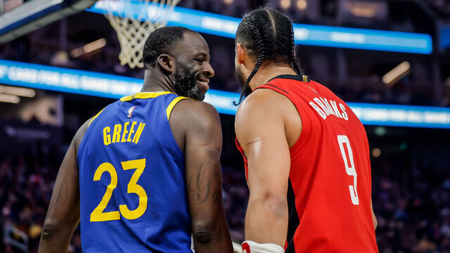 Draymond Green (23) grins at Dillon Brooks (9) after fouling him in the first half as the Golden State Warriors played the Houston Rockets at Chase Center in San Francisco, on Sunday, April 6, 2025.