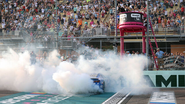 HOMESTEAD, FL - MARCH 23: Kyle Larson (#5 Hendrick Motorsports HendrickCars.com Chevrolet) and team celebrate winning the NASCAR Cup Series Straight Talk Wireless 400 on March 23, 2025, at Homestead-Miami Speedway in Homestead, FL.