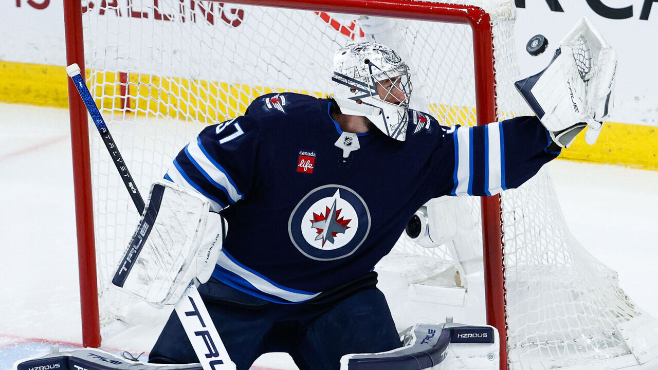 WINNIPEG, MB - MAY 04: Winnipeg Jets goalie Connor Hellebuyck (37) makes a save during the second period of game 7 of the first round of the Stanley Cup Playoffs between the Winnipeg Jets and the St. Louis Blues on May 04, 2025 at the Canada Life Centre Winnipeg, Manitoba.