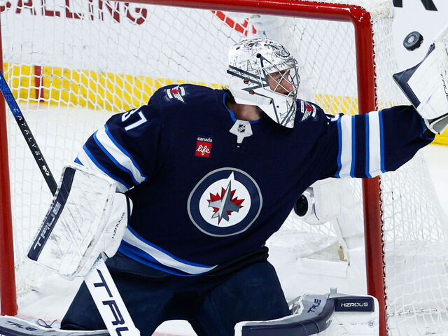 WINNIPEG, MB - MAY 04: Winnipeg Jets goalie Connor Hellebuyck (37) makes a save during the second period of game 7 of the first round of the Stanley Cup Playoffs between the Winnipeg Jets and the St. Louis Blues on May 04, 2025 at the Canada Life Centre Winnipeg, Manitoba.