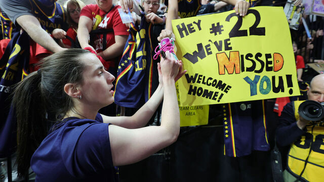 IOWA CITY, IA - MAY 4: Caitlin Clark #22 of the Indiana Fever signs autographs before the game against the Brazil Women's National Basketball Team during the WNBA preseason game on May 4, 2025 at Carver-Hawkeye Arena in Iowa City, Iowa. Mandatory Copyright Notice: Copyright 2025 NBAE