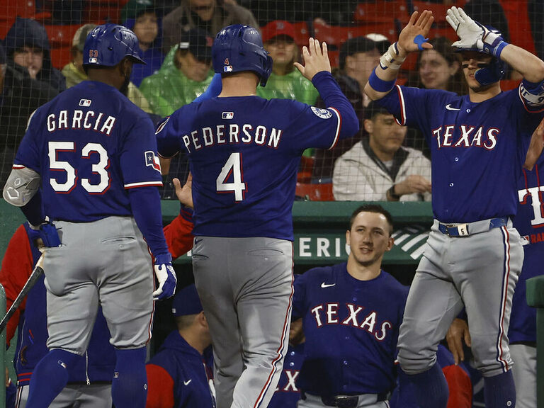 Rangers record 16 hits with new hitting coach Boone to beat Red Sox ...