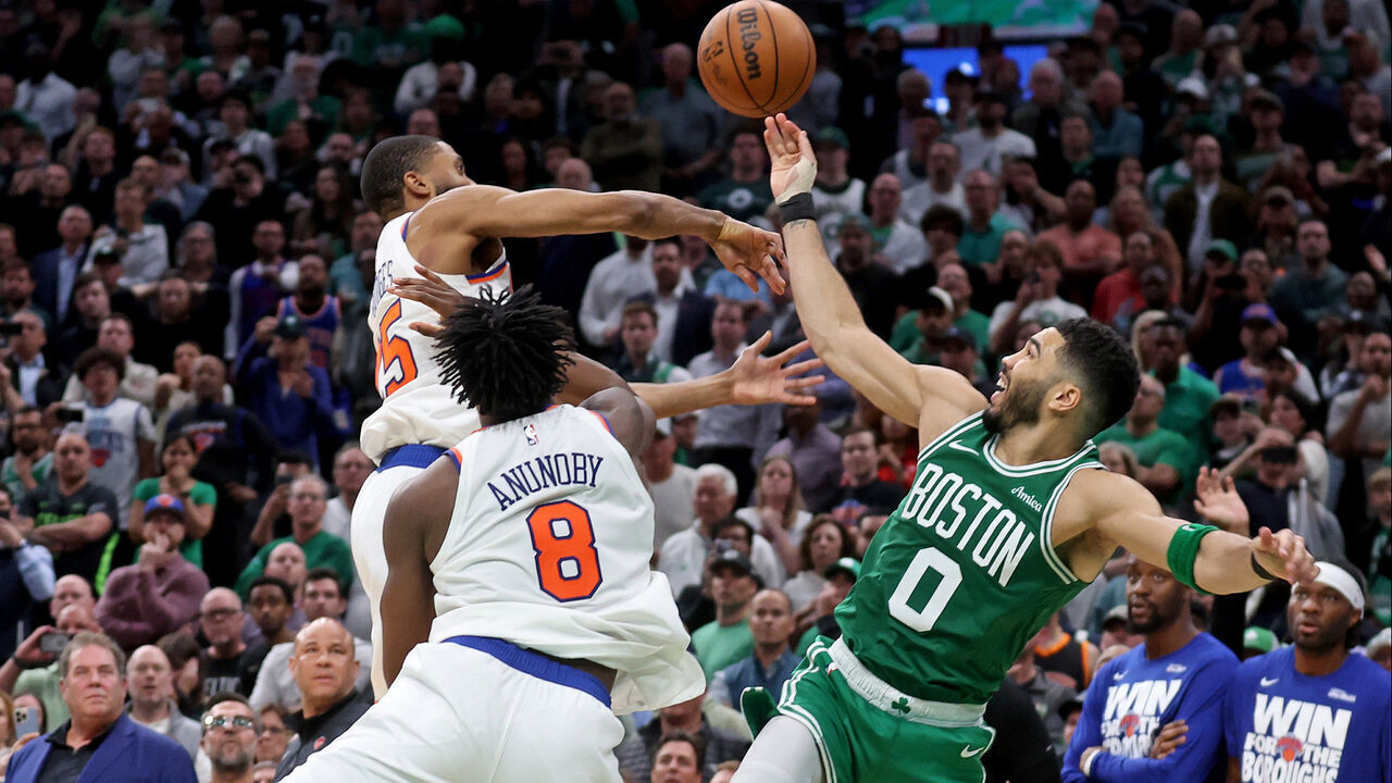 Boston, MA - May 7 - Mikal Bridges #25 and OG Anunoby #8 of the New York Knicks shut down Jayson Tatum #0 of the Boston Celtics in the last second, allowing the Knicks to win Game 2 of the Eastern Conference semifinals at the Garden.