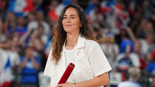 PARIS, FRANCE - AUGUST 11: Sue Bird looks on before the game during the Women's Gold Medal game between the French National Team and USA Women's National Team at the AccorHotels Arena on August 11, 2024 in Lille, France. NOTE TO USER: User expressly acknowledges and agrees that, by downloading and/or using this photograph, user is consenting to the terms and conditions of the Getty Images License Agreement. Mandatory Copyright Notice: Copyright 2024 NBAE