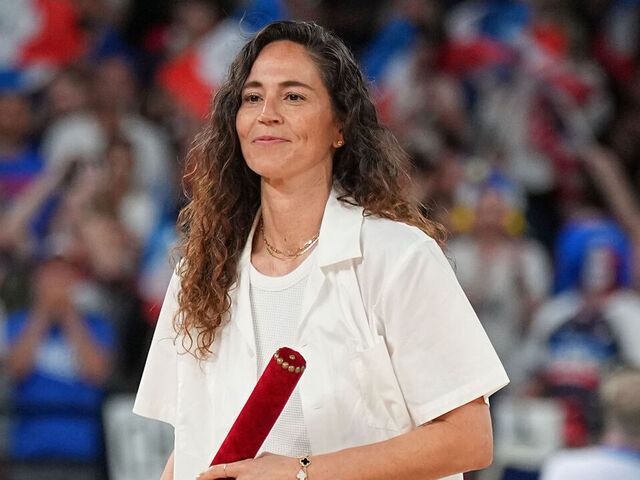 PARIS, FRANCE - AUGUST 11: Sue Bird looks on before the game during the Women's Gold Medal game between the French National Team and USA Women's National Team at the AccorHotels Arena on August 11, 2024 in Lille, France. NOTE TO USER: User expressly acknowledges and agrees that, by downloading and/or using this photograph, user is consenting to the terms and conditions of the Getty Images License Agreement. Mandatory Copyright Notice: Copyright 2024 NBAE