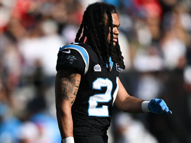 CHARLOTTE, NORTH CAROLINA - NOVEMBER 24: Jonathon Brooks #24 of the Carolina Panthers looks on during the second quarter of his game against the Kansas City Chiefs at Bank of America Stadium on November 24, 2024 in Charlotte, North Carolina.