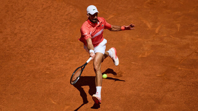 MADRID, SPAIN - APRIL 26: Novak Djokovic of Serbia plays a forehand against Matteo Arnaldi of Italy in the Men's Singles Second Round match during Day Five of the Mutua Madrid Open at La Caja Magica on April 26, 2025 in Madrid, Spain.