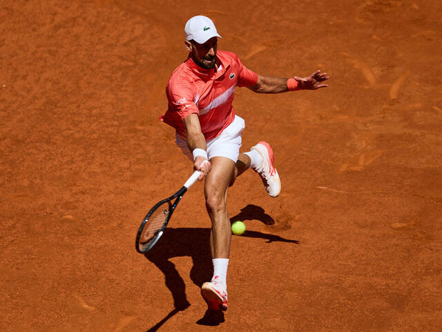 MADRID, SPAIN - APRIL 26: Novak Djokovic of Serbia plays a forehand against Matteo Arnaldi of Italy in the Men's Singles Second Round match during Day Five of the Mutua Madrid Open at La Caja Magica on April 26, 2025 in Madrid, Spain.