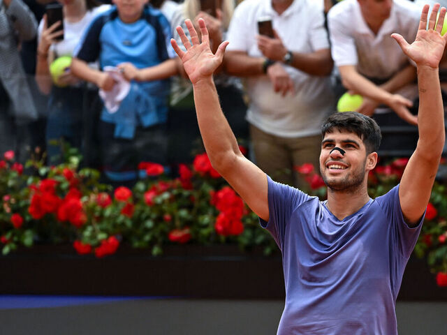 Spain's Carlos Alcaraz celebrates after victory in his men's singles match against Serbia's Dusan Lajovic for the ATP Rome Open tennis tournament at Foro Italico in Rome on May 9, 2025.