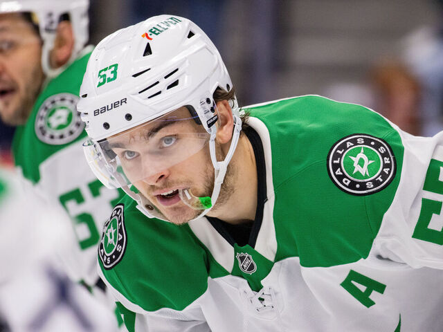 DENVER, COLORADO - MAY 01: Wyatt Johnston #53 of the Dallas Stars leans down during a face-off in the second period of Game Six of the First Round of the Stanley Cup Playoffs against the Colorado Avalanche at Ball Arena on May 01, 2025 in Denver, Colorado.