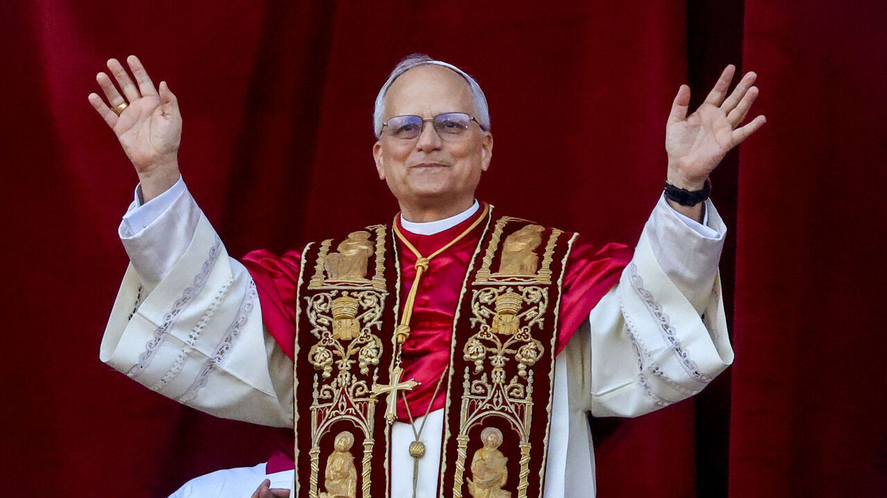 ST PETER SQUARE, VATICAN CITY, VATICAN - 2025/05/08: Pope Leo 14th, American Cardinal Robert Francis Prevost, waves on the Balcony of Benedictions of St. Peter's Basilica after the cardinals assembled in the Conclave elected him.