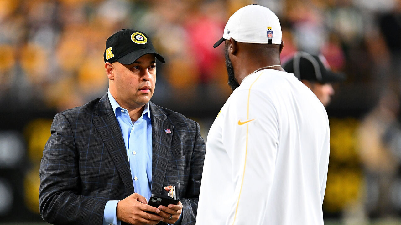 PITTSBURGH, PENNSYLVANIA - OCTOBER 20: General manager Omar Khan of the Pittsburgh Steelers talks with head coach Mike Tomlin prior to the game against the New York Jets at Acrisure Stadium on October 20, 2024 in Pittsburgh, Pennsylvania.