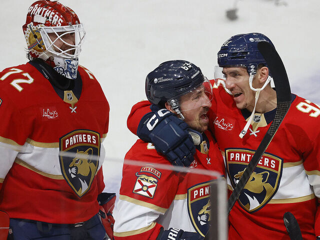 SUNRISE, FLORIDA - MAY 9: Brad Marchand #63 of the Florida Panthers celebrates his game winning goal with teammate Tomas Nosek #92 against the Toronto Maple Leafs in Game Three of the Second Round of the 2025 Stanley Cup Playoffs at the Amerant Bank Arena on May 9, 2025 in Sunrise, Florida.